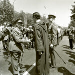 Francisco Franco preside el XXVI Desfile de la Victoria, le acompañan en la presidencia el príncipe Juan Carlos y el el príncipe Muley Abdullah, hermano del rey de Marruecos 09-05-1945